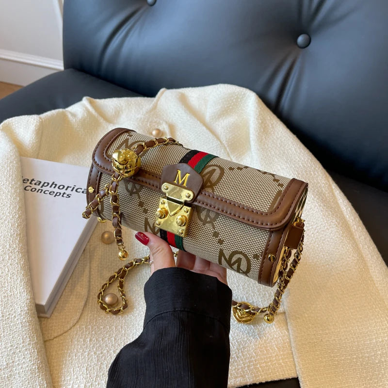 Light luxury brand-name high-end designer bag female 2025 new spring and summer niche shoulder bag messenger bag cylinder bag